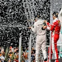 Tom Walton (GBR) Mercedes AMG F1 Engineer, Nico Rosberg (GER) Mercedes AMG F1, Lewis Hamilton (GBR) Mercedes AMG F1 and Sebastian Vettel (GER) Ferrari celebrate on the podium with the champagne at Formula One World Championship, Rd19, Mexican Grand Prix, Race, Circuit Hermanos Rodriguez, Mexico City, Mexico, Sunday 30 October 2016. © Sutton Images