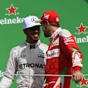 Lewis Hamilton (GBR) Mercedes AMG F1 and Sebastian Vettel (GER) Ferrari celebrate on the podium at Formula One World Championship, Rd19, Mexican Grand Prix, Race, Circuit Hermanos Rodriguez, Mexico City, Mexico, Sunday 30 October 2016. © Sutton Images