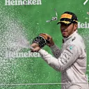 Race winner Lewis Hamilton (GBR) Mercedes AMG F1 celebrates on the podium with the champagne at Formula One World Championship, Rd19, Mexican Grand Prix, Race, Circuit Hermanos Rodriguez, Mexico City, Mexico, Sunday 30 October 2016. © Sutton Images