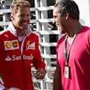 Sebastian Vettel (GER) Ferrari and Juan Pablo Montoya (COL) at Formula One World Championship, Rd19, Mexican Grand Prix, Preparations, Circuit Hermanos Rodriguez, Mexico City, Mexico, Thursday 27 October 2016. © Sutton Images