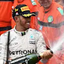 Race winner Lewis Hamilton (GBR) Mercedes AMG F1 celebrates at the podium with the champagne at Formula One World Championship, Rd6, Monaco Grand Prix, Race, Monte-Carlo, Monaco, Sunday 29 May 2016. © Sutton Images