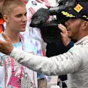 Race winner Lewis Hamilton (GBR) Mercedes AMG F1 and Justin Bieber (USA) in parc ferme at Formula One World Championship, Rd6, Monaco Grand Prix, Race, Monte-Carlo, Monaco, Sunday 29 May 2016. © Sutton Images
