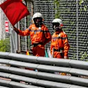 Marshals wave red flag in FP1 at Formula One World Championship, Rd6, Monaco Grand Prix, Practice, Monte-Carlo, Monaco, Thursday 26 May 2016. © Sutton Images