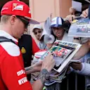 Kimi Raikkonen (FIN) Ferrari signs autographs for the fans at Formula One World Championship, Rd6, Monaco Grand Prix, Preparations, Monte-Carlo, Monaco, Wednesday 25 May 2016. © Sutton Images