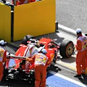 The car of Sebastian Vettel (GER) Ferrari SF16-H is pushed into pit lane by the marshals in FP2 at Formula One World Championship, Rd4, Russian Grand Prix, Practice, Sochi Autodrom, Sochi, Krasnodar Krai, Russia, Friday 29 April 2016. © Sutton Motorsport Images