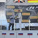 Lewis Hamilton (GBR) Mercedes AMG F1, race winner Nico Rosberg (GER) Mercedes AMG F1 and Kimi Raikkonen (FIN) Ferrari celebrate with champagne on the podium at Formula One World Championship, Rd4, Russian Grand Prix, Race, Sochi Autodrom, Sochi, Krasnodar Krai, Russia, Sunday 1 May 2016. © Sutton Motorsport Images