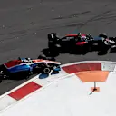 Jenson Button (GBR) McLaren MP4-31 and Pascal Wehrlein (GER) Manor Racing MRT05 battle at Formula One World Championship, Rd4, Russian Grand Prix, Race, Sochi Autodrom, Sochi, Krasnodar Krai, Russia, Sunday 1 May 2016. © Sutton Motorsport Images