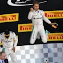 Lewis Hamilton (GBR) Mercedes AMG F1, Nico Rosberg (GER) Mercedes AMG F1 and Kimi Raikkonen (FIN) Ferrari celebrate on the podium with Vladimir Putin (RUS), President of Russia and Dmitry Kozak (RUS) Deputy Prime Minister of the Russian Federation at Formula One World Championship, Rd4, Russian Grand Prix, Race, Sochi Autodrom, Sochi, Krasnodar Krai, Russia, Sunday 1 May 2016. © Sutton Motorsport Images