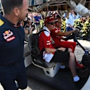Christian Horner (GBR) Red Bull Racing Team Principal with Kimi Raikkonen (FIN) Ferrari at Formula One World Championship, Rd15, Singapore Grand Prix, Practice, Marina Bay Street Circuit, Singapore, Friday 16 September 2016. © Sutton Images