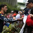 Daniel Ricciardo (AUS) Red Bull Racing signs autographs for the fans at Formula One World Championship, Rd15, Singapore Grand Prix, Qualifying, Marina Bay Street Circuit, Singapore, Saturday 17 September 2016. © Sutton Images