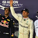 (L to R): Daniel Ricciardo (AUS) Red Bull Racing, pole sitter Nico Rosberg (GER) Mercedes AMG F1 and Lewis Hamilton (GBR) Mercedes AMG F1 celebrate in parc ferme at Formula One World Championship, Rd15, Singapore Grand Prix, Qualifying, Marina Bay Street Circuit, Singapore, Saturday 17 September 2016. © Sutton Images