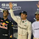 (L to R): Daniel Ricciardo (AUS) Red Bull Racing, pole sitter Nico Rosberg (GER) Mercedes AMG F1 and Lewis Hamilton (GBR) Mercedes AMG F1 celebrate in parc ferme at Formula One World Championship, Rd15, Singapore Grand Prix, Qualifying, Marina Bay Street Circuit, Singapore, Saturday 17 September 2016. © Sutton Images
