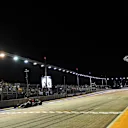 Carlos Sainz (ESP) Scuderia Toro Rosso STR11 takes the chequered flag at the end of Qualifying at Formula One World Championship, Rd15, Singapore Grand Prix, Qualifying, Marina Bay Street Circuit, Singapore, Saturday 17 September 2016. © Sutton Images