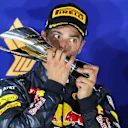 Daniel Ricciardo (AUS) Red Bull Racing celebrates on the podium with the trophy at Formula One World Championship, Rd15, Singapore Grand Prix, Race, Marina Bay Street Circuit, Singapore, Sunday 18 September 2016. © Sutton Images