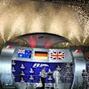 Mark Ellis (GBR) Mercedes AMG F1 Performance Director, Lewis Hamilton (GBR) Mercedes AMG F1, Daniel Ricciardo (AUS) Red Bull Racing and race winner Nico Rosberg (GER) Mercedes AMG F1 celebrate on the podium with the champagne at Formula One World Championship, Rd15, Singapore Grand Prix, Race, Marina Bay Street Circuit, Singapore, Sunday 18 September 2016. © Sutton Images