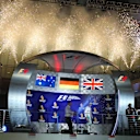 Mark Ellis (GBR) Mercedes AMG F1 Performance Director, Lewis Hamilton (GBR) Mercedes AMG F1, Daniel Ricciardo (AUS) Red Bull Racing and race winner Nico Rosberg (GER) Mercedes AMG F1 celebrate on the podium with the champagne at Formula One World Championship, Rd15, Singapore Grand Prix, Race, Marina Bay Street Circuit, Singapore, Sunday 18 September 2016. © Sutton Images