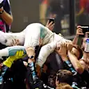 Race winner Nico Rosberg (GER) Mercedes AMG F1 celebrates in parc ferme with the team at Formula One World Championship, Rd15, Singapore Grand Prix, Race, Marina Bay Street Circuit, Singapore, Sunday 18 September 2016. © Sutton Images