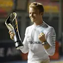 Race winner Nico Rosberg (GER) Mercedes AMG F1 celebrates wit hthe trophy at Formula One World Championship, Rd15, Singapore Grand Prix, Race, Marina Bay Street Circuit, Singapore, Sunday 18 September 2016. © Sutton Images