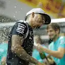 Lewis Hamilton (GBR) Mercedes AMG F1 celebrates with the team and the champagne at Formula One World Championship, Rd15, Singapore Grand Prix, Race, Marina Bay Street Circuit, Singapore, Sunday 18 September 2016. © Sutton Images