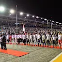 National Anthem is observed on the grid at Formula One World Championship, Rd15, Singapore Grand Prix, Race, Marina Bay Street Circuit, Singapore, Sunday 18 September 2016. © Sutton Images