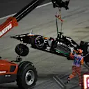 The crashed car of Nico Hulkenberg (GER) Force India VJM09 is recovered at Formula One World Championship, Rd15, Singapore Grand Prix, Race, Marina Bay Street Circuit, Singapore, Sunday 18 September 2016. © Sutton Images