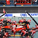 Sebastian Vettel (GER) Ferrari SF16-H pit stop at Formula One World Championship, Rd15, Singapore Grand Prix, Race, Marina Bay Street Circuit, Singapore, Sunday 18 September 2016. © Sutton Images