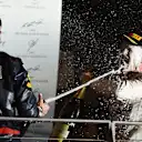 Race winner Nico Rosberg (GER) Mercedes-Benz F1 W07 Hybrid celebrates with Daniel Ricciardo (AUS) Red Bull Racing and the champagne on the podium at Formula One World Championship, Rd15, Singapore Grand Prix, Race, Marina Bay Street Circuit, Singapore, Sunday 18 September 2016. © Sutton Images