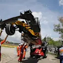 The car of Jolyon Palmer (GBR) Renault Sport F1 Team RS16 is recovered after a rear tyre deflation in FP2 at Formula One World Championship, Rd5, Spanish Grand Prix, Practice, Barcelona, Spain, Friday 13 May 2016. © Sutton Images