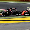 Carlos Sainz (ESP) Scuderia Toro Rosso STR11 and Kimi Raikkonen (FIN) Ferrari SF16-H battle at Formula One World Championship, Rd5, Spanish Grand Prix, Race, Barcelona, Spain, Sunday 15 May 2016. © Sutton Motorsport Images