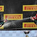 Race winner Max Verstappen (NED) Red Bull Racing celebrates on the podium with the Sebastian Vettel (GER) Ferrari and the champagne at Formula One World Championship, Rd5, Spanish Grand Prix, Race, Barcelona, Spain, Sunday 15 May 2016. © Sutton Motorsport Images
