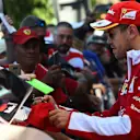 Sebastian Vettel (GER) Ferrari signs autographs for the fans at Formula One World Championship, Rd18, United States Grand Prix, Practice, Circuit of the Americas, Austin, Texas, USA, Friday 21 October 2016. © Sutton Images