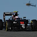 Jenson Button (GBR) McLaren MP4-31 and helicopter at Formula One World Championship, Rd18, United States Grand Prix, Qualifying, Circuit of the Americas, Austin, Texas, USA, Saturday 22 October 2016. © Sutton Images