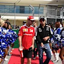 Sebastian Vettel (GER) Ferrari and Sergio Perez (MEX) Force India on the drivers parade at Formula One World Championship, Rd18, United States Grand Prix, Race, Circuit of the Americas, Austin, Texas, USA, Sunday 23 October 2016. © Sutton Images