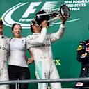 Nico Rosberg (GER) Mercedes AMG F1, Victoria Vowles (GBR) Mercedes AMG F1 Partner Services Director, race winner Lewis Hamilton (GBR) Mercedes AMG F1 and Daniel Ricciardo (AUS) Red Bull Racing celebrate on the podium withthe champagne and the trophies at Formula One World Championship, Rd18, United States Grand Prix, Race, Circuit of the Americas, Austin, Texas, USA, Sunday 23 October 2016. © Sutton Images