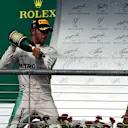 Race winner Lewis Hamilton (GBR) Mercedes AMG F1 celebrates on the podium with the champagne at Formula One World Championship, Rd18, United States Grand Prix, Race, Circuit of the Americas, Austin, Texas, USA, Sunday 23 October 2016. © Sutton Images