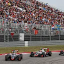 Romain Grosjean (FRA) Haas VF-16 and Esteban Gutierrez (MEX) Haas VF-16 battle with Sergio Perez (MEX) Force India VJM09 at Formula One World Championship, Rd18, United States Grand Prix, Race, Circuit of the Americas, Austin, Texas, USA, Sunday 23 October 2016. © Sutton Images