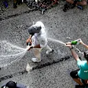 Race winner Lewis Hamilton (GBR) Mercedes AMG F1 celebrates with the team and the champagne at Formula One World Championship, Rd18, United States Grand Prix, Race, Circuit of the Americas, Austin, Texas, USA, Sunday 23 October 2016. © Sutton Images
