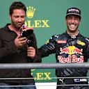 Daniel Ricciardo (AUS) Red Bull Racing offers Gerard Butler (GBR) Actor a drink from his shoe on the podium at Formula One World Championship, Rd18, United States Grand Prix, Race, Circuit of the Americas, Austin, Texas, USA, Sunday 23 October 2016. © Sutton Images