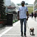 Lewis Hamilton (GBR) Mercedes AMG F1 with his dog Roscoe at Formula One World Championship, Rd18, United States Grand Prix, Preparations, Circuit of the Americas, Austin, Texas, USA, Thursday 20 October 2016. © Sutton Images