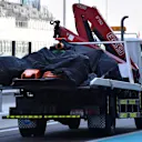 The car of Oliver Turvey (GBR) McLaren MCL32 is recovered to the pits at Formula One Testing, Day One, Yas Marina Circuit, Abu Dhabi, UAE, Tuesday 28 November 2017. © Mark Sutton/Sutton Images