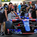 Scuderia Toro Rosso mechanics with Scuderia Toro Rosso STR12 at Formula One World Championship, Rd20, Abu Dhabi Grand Prix, Qualifying, Yas Marina Circuit, Abu Dhabi, UAE, Saturday 25 November 2017. © Kym Illman/Sutton Images