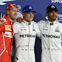 (L to R): Sebastian Vettel (GER) Ferrari, pole sitter Valtteri Bottas (FIN) Mercedes AMG F1 and Lewis Hamilton (GBR) Mercedes AMG F1 celebrate in parc ferme at Formula One World Championship, Rd20, Abu Dhabi Grand Prix, Qualifying, Yas Marina Circuit, Abu Dhabi, UAE, Saturday 25 November 2017. © Mark Sutton/Sutton Images