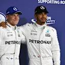 Pole sitter Valtteri Bottas (FIN) Mercedes AMG F1 and Lewis Hamilton (GBR) Mercedes AMG F1 celebrate in parc ferme at Formula One World Championship, Rd20, Abu Dhabi Grand Prix, Qualifying, Yas Marina Circuit, Abu Dhabi, UAE, Saturday 25 November 2017. © Mark Sutton/Sutton Images