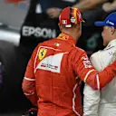 Pole sitter Bottas (FIN) Mercedes AMG F1 and Vettel (GER) Ferrari in parc ferme at Formula One World Championship, Rd20, Abu Dhabi Grand Prix, Qualifying, Yas Marina Circuit, Abu Dhabi, UAE, Saturday 25 November 2017. © Mark Sutton/Sutton Images