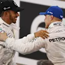 Pole sitter Valtteri Bottas (FIN) Mercedes AMG F1 and Lewis Hamilton (GBR) Mercedes AMG F1 celebrate in parc ferme at Formula One World Championship, Rd20, Abu Dhabi Grand Prix, Qualifying, Yas Marina Circuit, Abu Dhabi, UAE, Saturday 25 November 2017. © Mark Sutton/Sutton Images