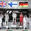 Lewis Hamilton (GBR) Mercedes AMG F1, Valtteri Bottas (FIN) Mercedes AMG F1 and Sebastian Vettel (GER) Ferrari on the podium at Formula One World Championship, Rd20, Abu Dhabi Grand Prix, Race, Yas Marina Circuit, Abu Dhabi, UAE, Sunday 26 November 2017. © Manuel Goria/Sutton Images