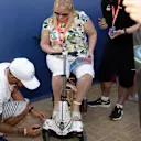 Lewis Hamilton (GBR) Mercedes AMG F1 signs a mobility scooter at Formula One World Championship, Rd20, Abu Dhabi Grand Prix, Preparations, Yas Marina Circuit, Abu Dhabi, UAE, Thursday 23 November 2017. © Simon Galloway/Sutton Images