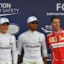 (L to R): Valtteri Bottas (FIN) Mercedes AMG, pole sitter Lewis Hamilton (GBR) Mercedes AMG and Sebastian Vettel (GER) Ferrari celebrate at F1 World Championship, Australian Grand Prix, Melbourne, Australia, 25 March 2017. ©Sutton Motorsport Images