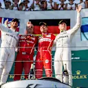 Race winners Ferrari and Mercedes AMG F1 celebrate on the podium at Formula One World Championship, Rd1, Australian Grand Prix, Race, Albert Park, Melbourne, Australia, Sunday 26 March 2017. © Sutton Motorsport Images