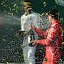 Lewis Hamilton (GBR) Mercedes AMG and Sebastian Vettel (GER) Ferrari celebrate on the podium with the champagne at Formula One World Championship, Australian Grand Prix, Albert Park, Melbourne, Australia, Sunday 26 March 2017. © Sutton Motorsport Images